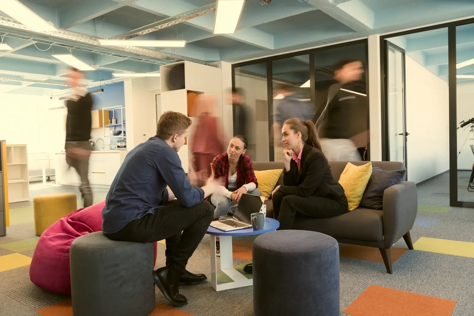 colleagues-meeting-in-office-lounge-area